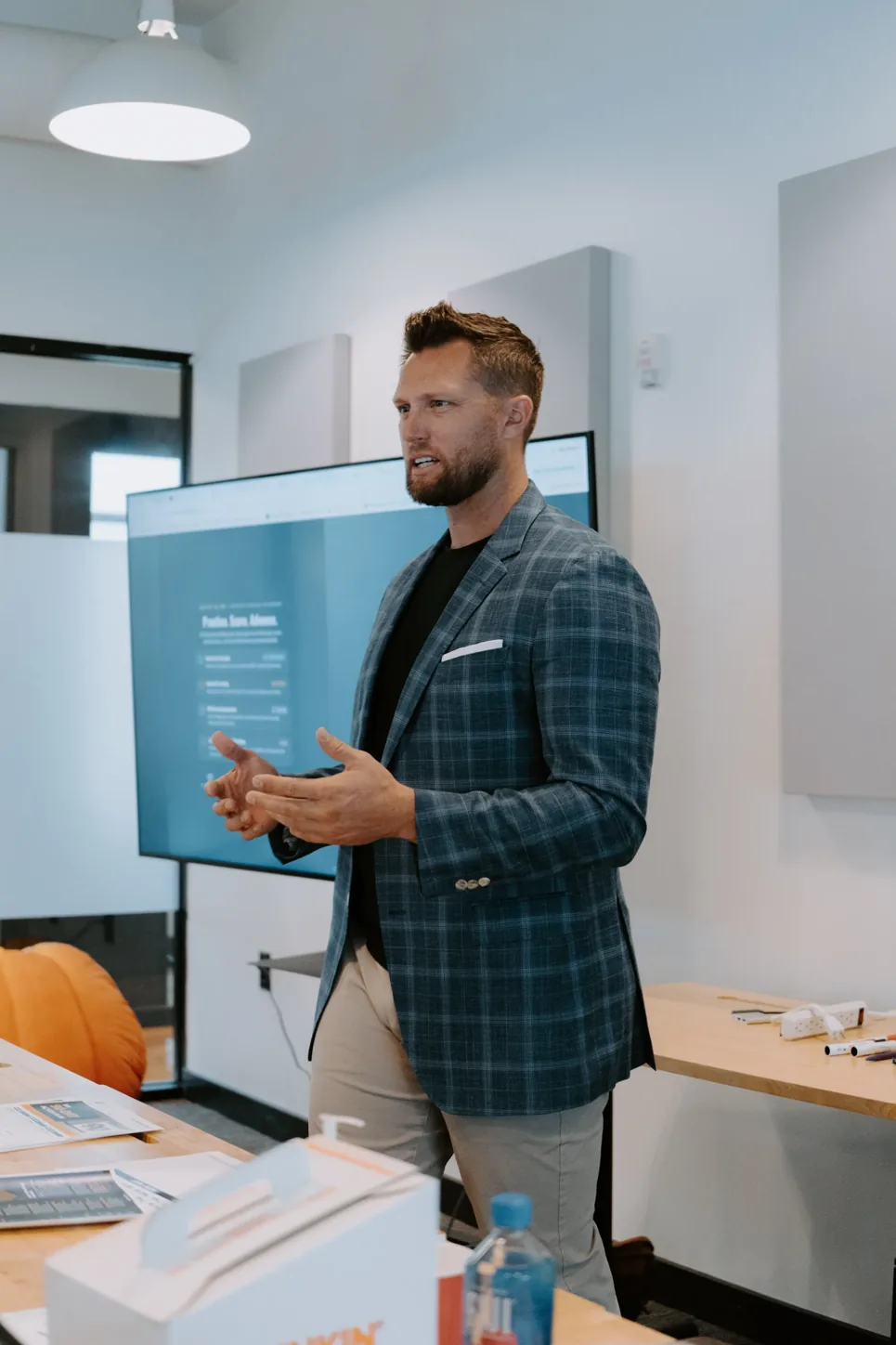 Ryan speaking in a business setting